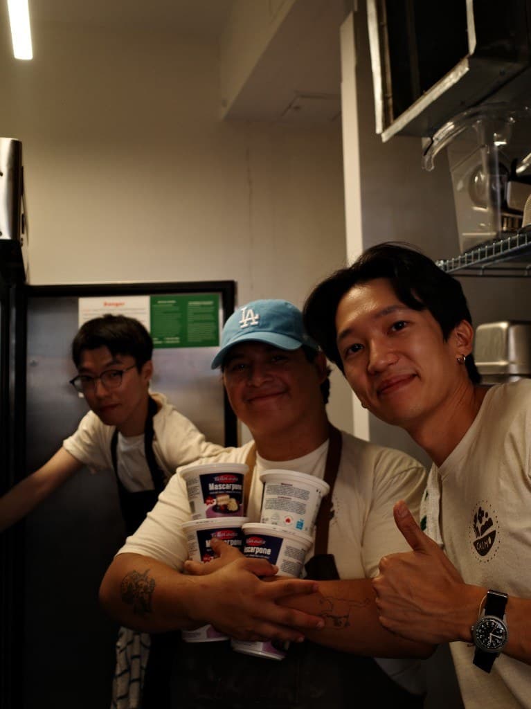 Calmo kitchen team holding mascarpone in the prep area