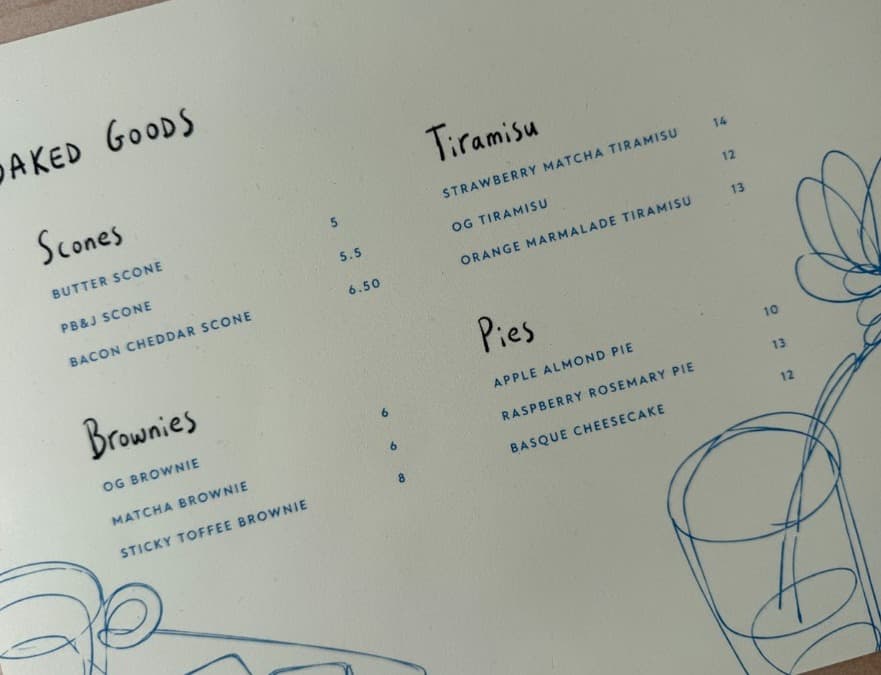 Calmo baked goods menu with scones, brownies, tiramisu, and pies