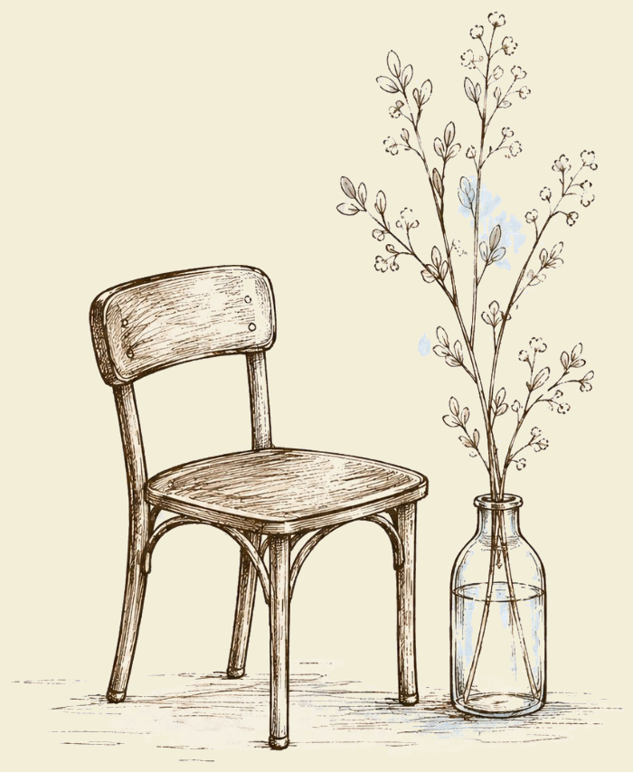 A simple wooden chair beside a vase with budding branches